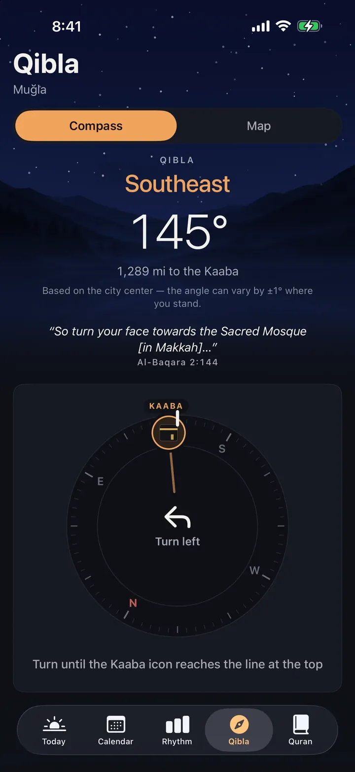 The Qibla screen on iPhone: from Muğla the qibla is southeast, 145°, 1,289 mi to the Kaaba; the compass shows the Kaaba mark and a “Turn left” cue.